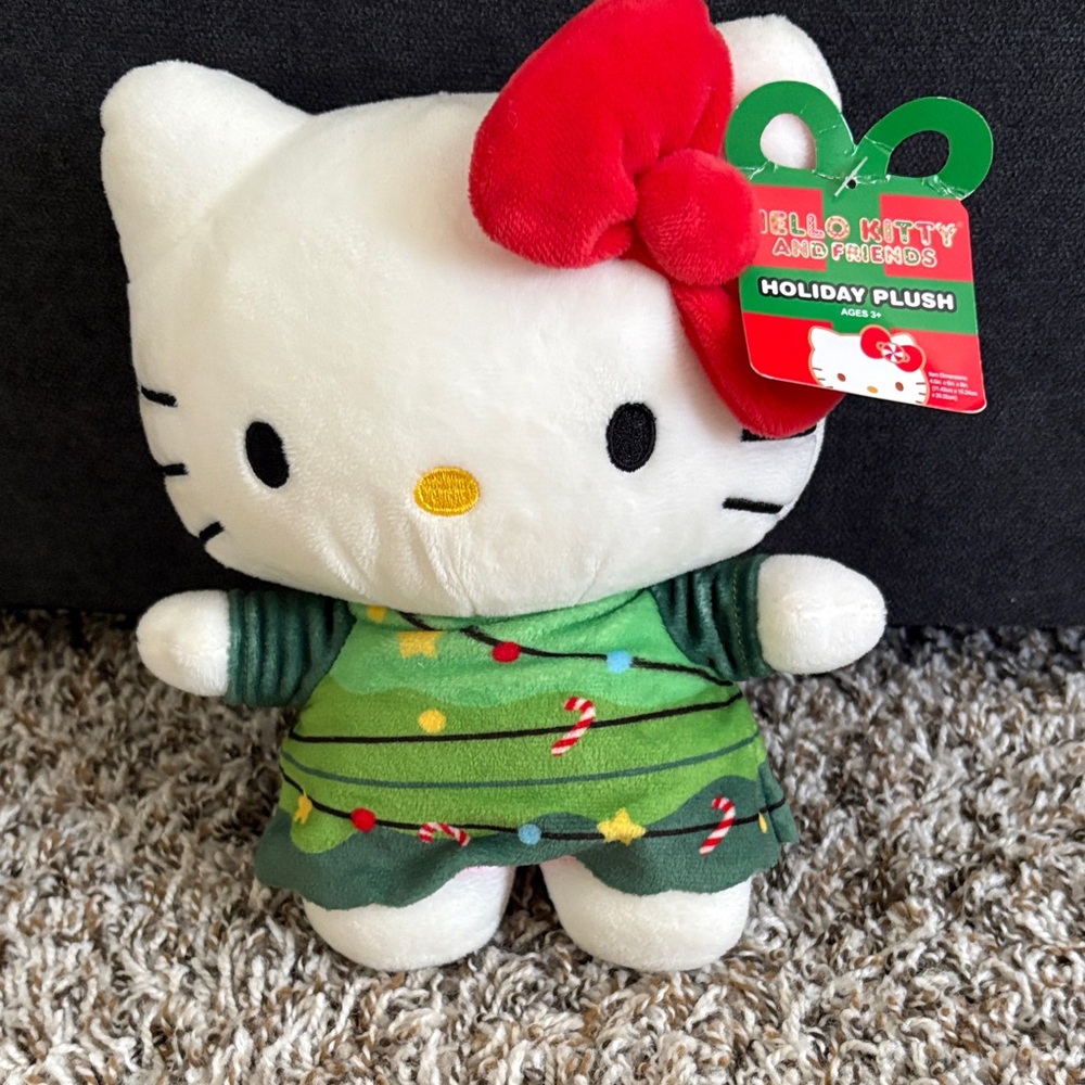 Brand new —Hello Kitty Festive Plush with Red Bow and Green Outfit